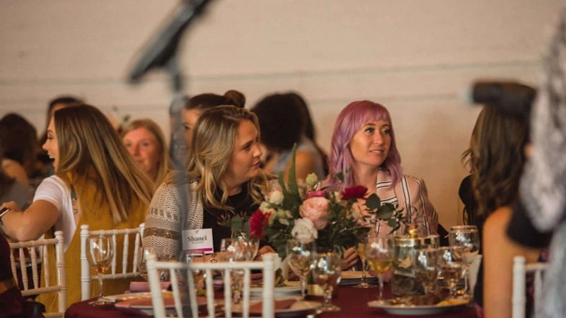 Friends sharing conversation around the table