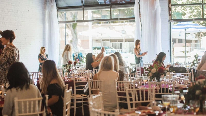 Members gathered at a Powered by Women event